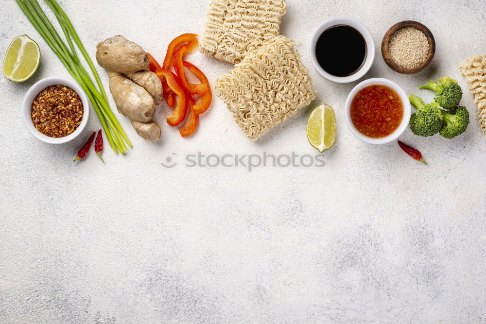 Similar – Couscous with vegetable ingredients in bowls