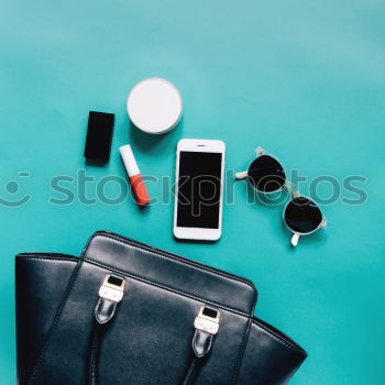 Similar – Image, Stock Photo Flat lay of woman bag open out with cosmetics