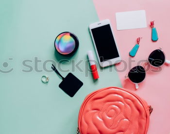 Similar – Image, Stock Photo Flat lay of woman bag open out with cosmetics