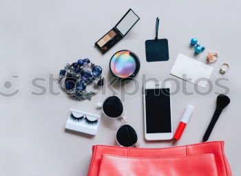 Image, Stock Photo Flat lay of woman bag open out with cosmetics