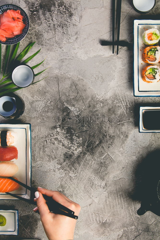 Similar – Crop woman eating sushi