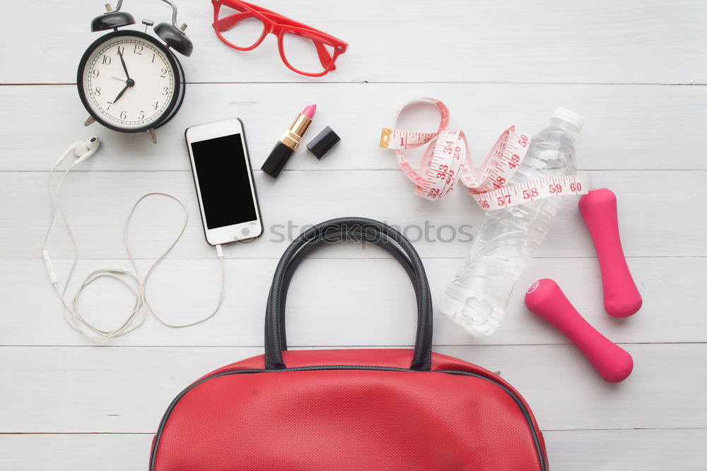 Similar – Image, Stock Photo Flat lay of woman bag open out with cosmetics