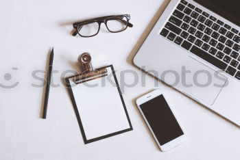 Similar – Image, Stock Photo shoes, camera, smartphone, glasses, keyboard