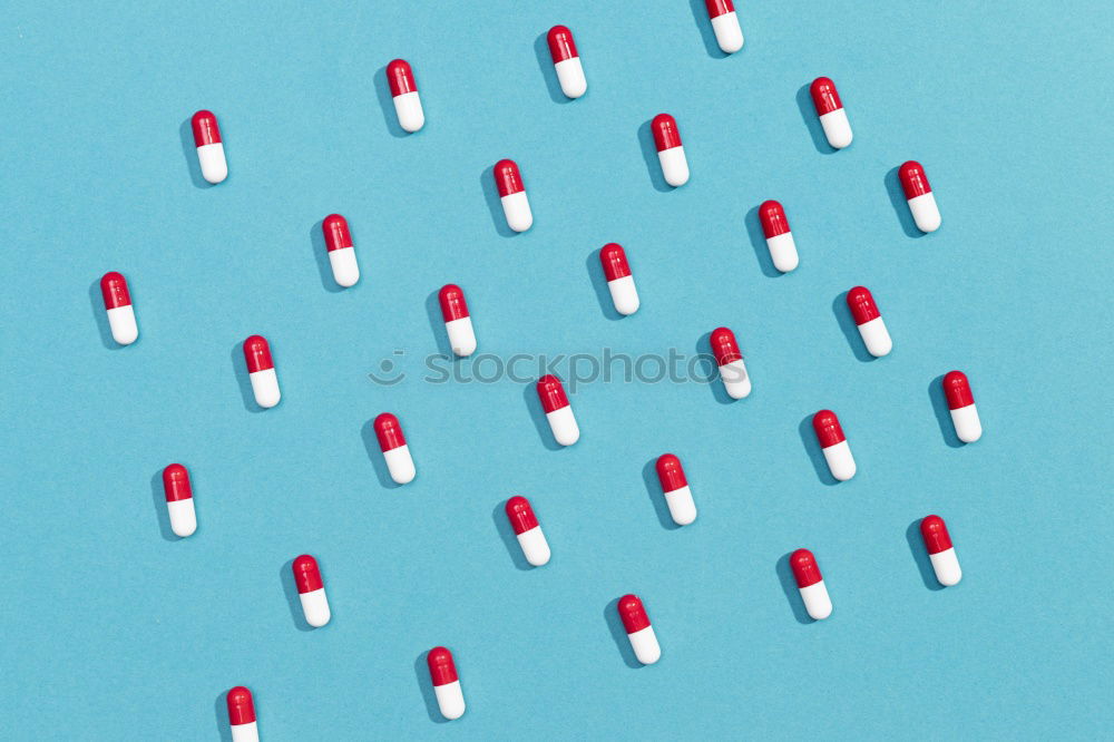 Image, Stock Photo Two capsule-shaped red and white pills made of paper