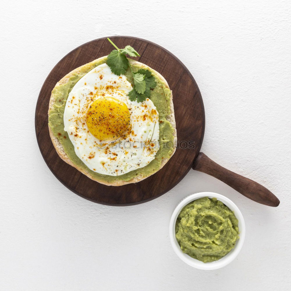 Similar – Image, Stock Photo Fresh spinach with cooking ingredients in an old sieve