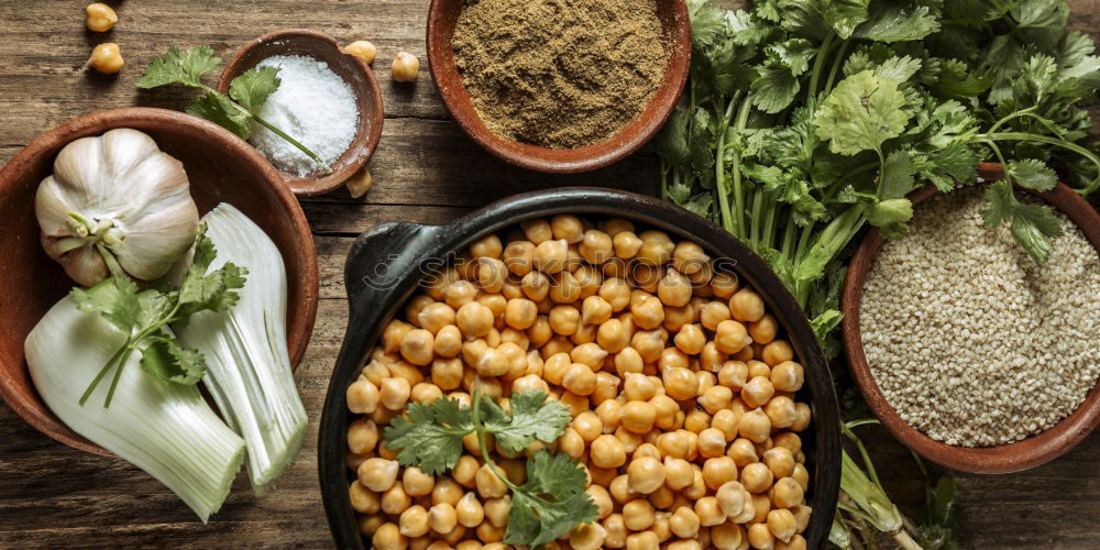 Similar – Image, Stock Photo Lentils with fresh vegetables and ingredients for cooking