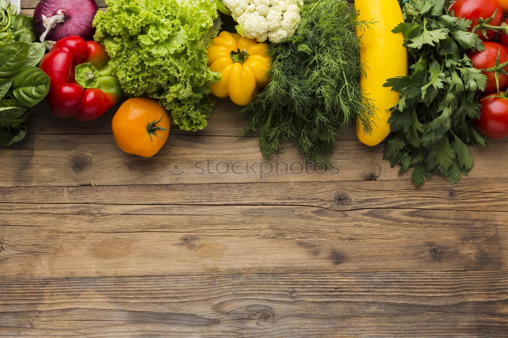 Similar – Vegetables and utensils on kitchen table