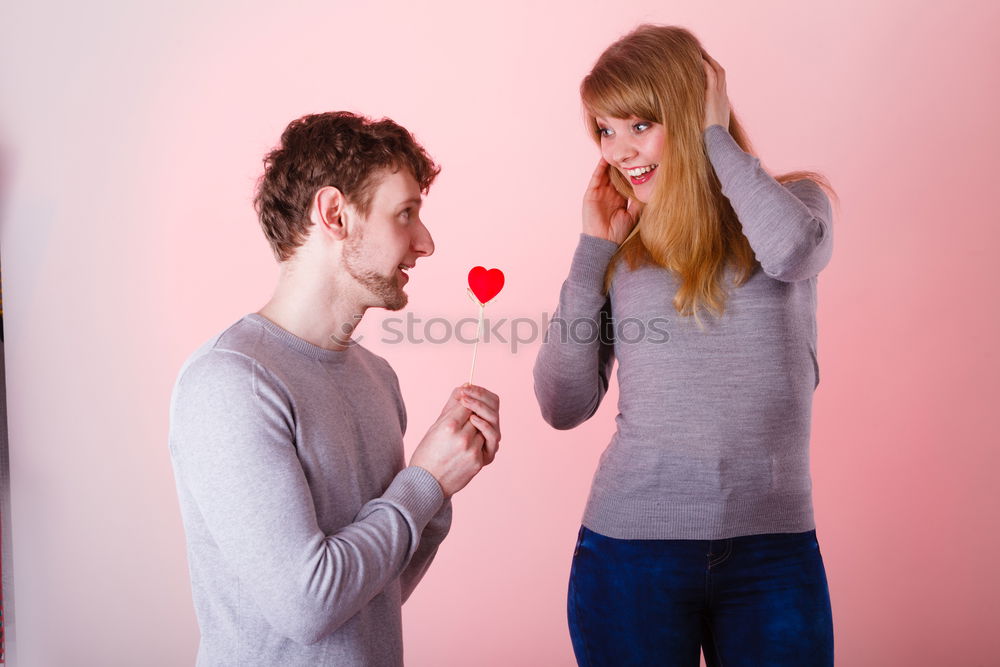 Similar – Portrait of couple of young people arguing