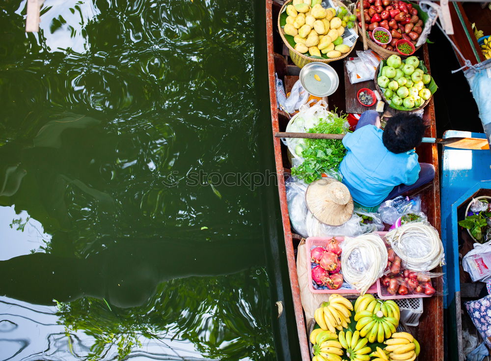 Similar – Image, Stock Photo Asian woman drinking from coconut