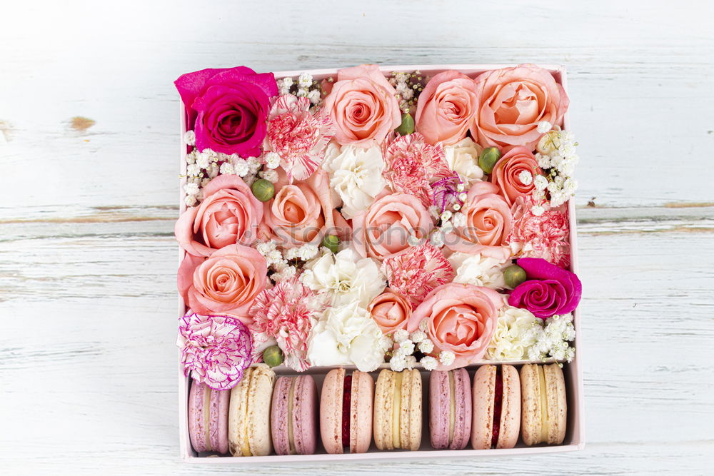 Similar – Composition of pink accessories to female holidays: Mothers day , Womens day, birthday or wedding. Paper shopping bag with flowers,paper, party fan and ribbon on white background, top view