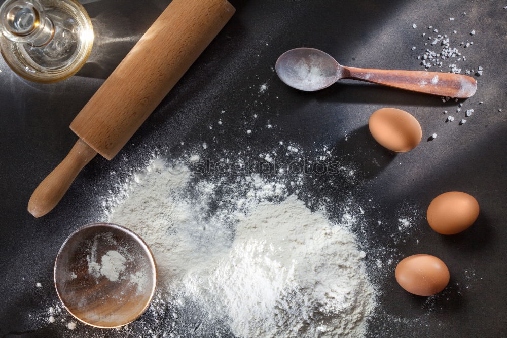 Similar – Image, Stock Photo White salt in a wooden bowl on a black surface