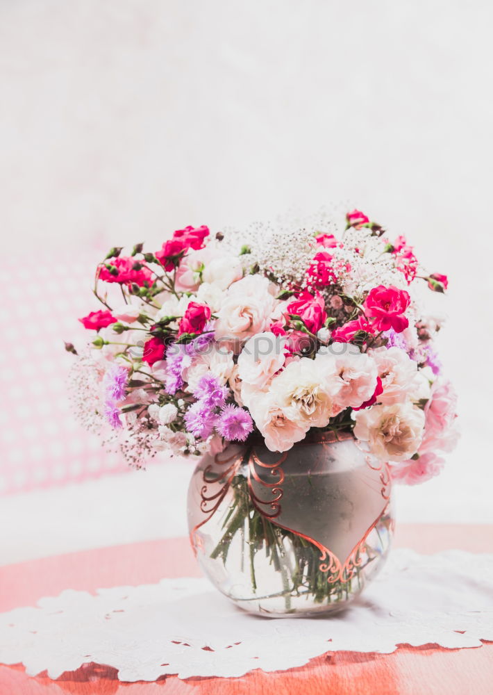 Similar – Ranunculus bundles in a glass vase