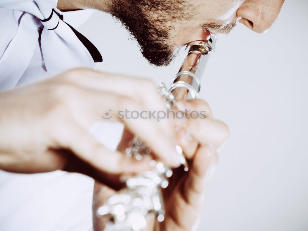 Similar – Smiling jazzman with sax