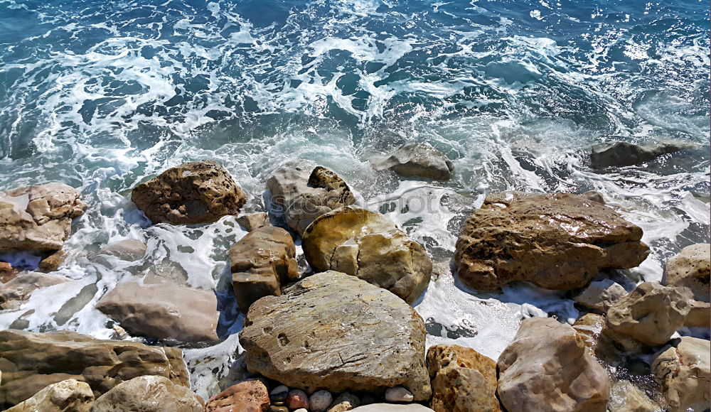 Similar – Stones as breakwaters