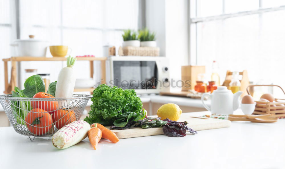 Similar – Image, Stock Photo Asparagus with ingredients on the kitchen table at the window