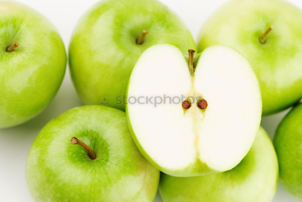 Similar – Image, Stock Photo Jammy half pear on green