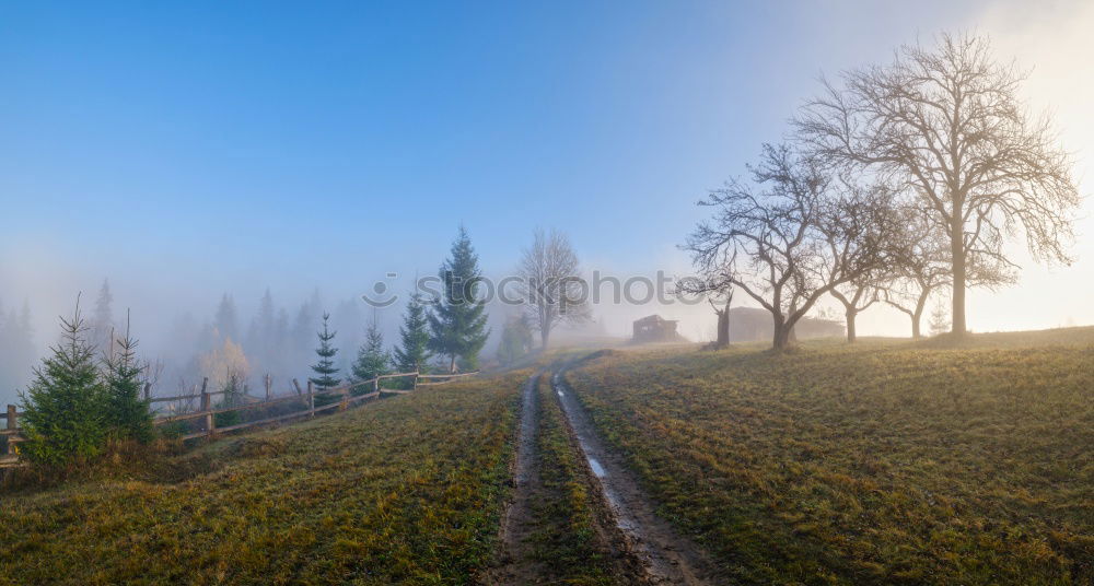 Similar – Alpine village under sun rays