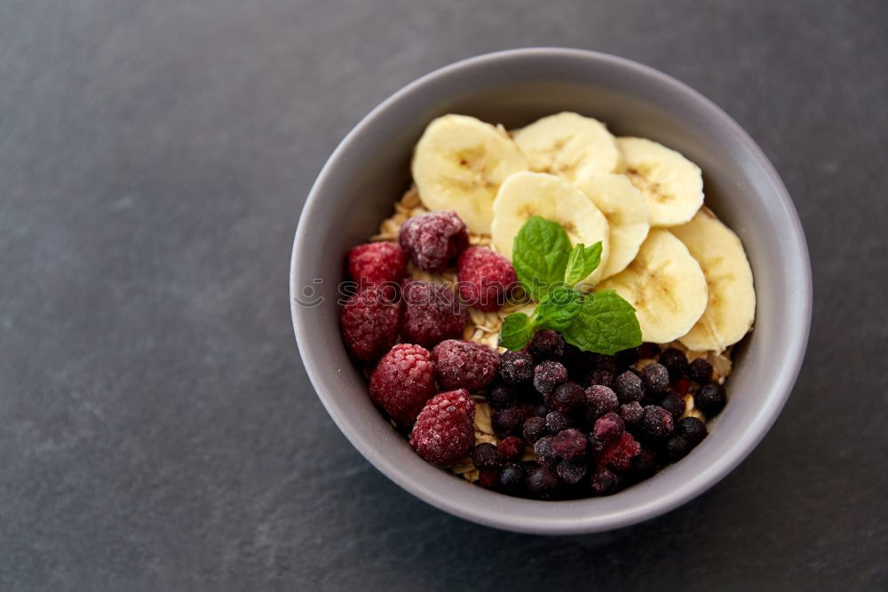 Similar – Acai bowl strawberry blueberry banana wooden table