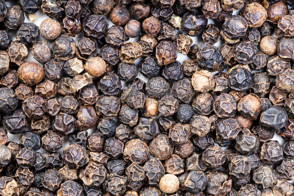 Similar – Image, Stock Photo Macro shot Black peppercorns on a wooden spoon