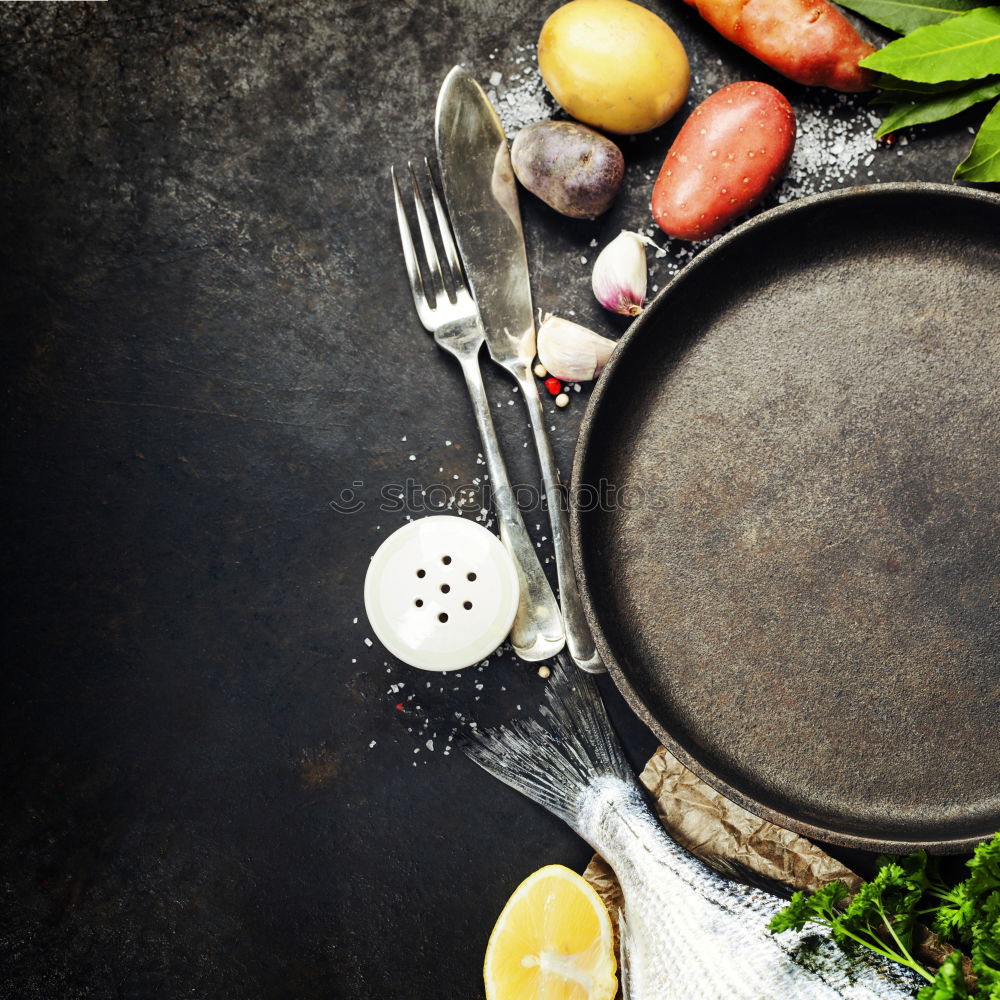 Similar – Image, Stock Photo Empty wok pan on kitchen table with chopsticks and vegetarian Asian food ingredients, top view. Copy space.  Healthy eating and cooking