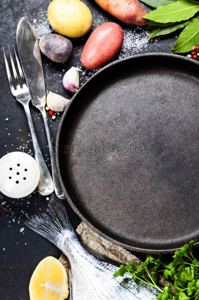 Similar – Image, Stock Photo Empty wok pan on kitchen table with chopsticks and vegetarian Asian food ingredients, top view. Copy space.  Healthy eating and cooking