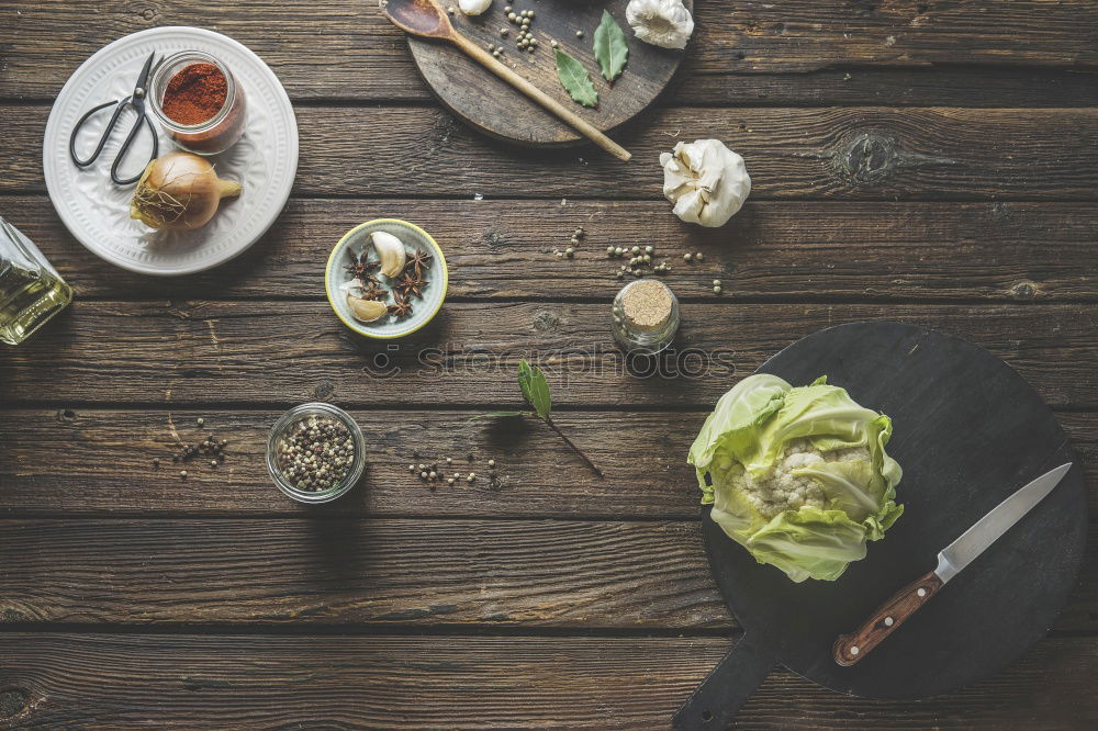 Similar – Home breakfast preparation with bagel bread, salmon, avocado , fresh cheese, hummus and cooked quail eggs on dark rustic wooden background, top view. Copy space for your design, banner