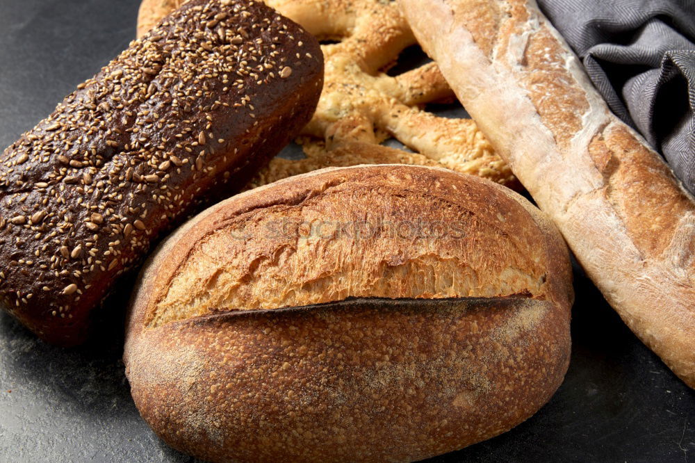 Similar – Many mixed breads and rolls.