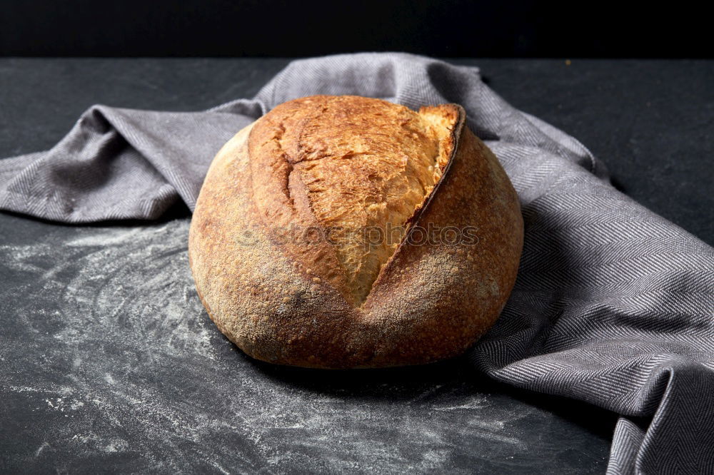 Similar – whole baked round bread