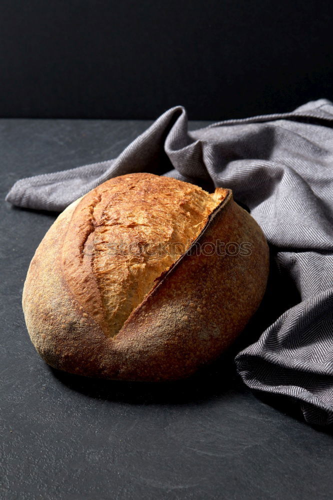 Similar – whole baked round bread