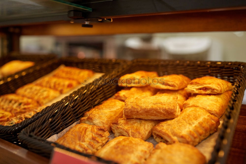 Baker carrying rack with fresh pastry