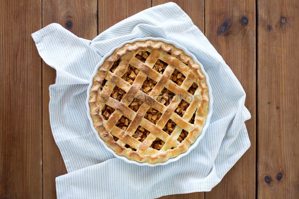 Similar – Image, Stock Photo Mini apple pie surrounded by various pies.
