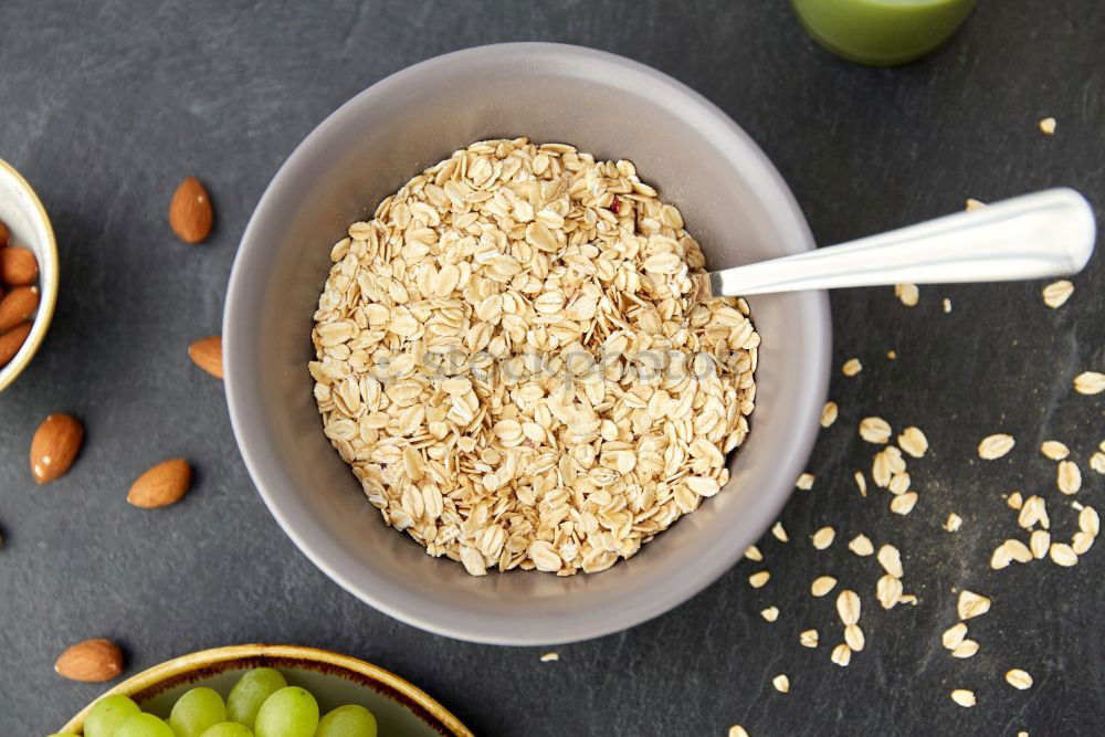 Similar – Oat flakes in blue bowl with berries