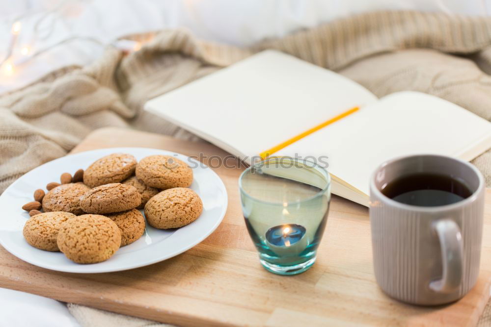 Similar – Image, Stock Photo A few books with cup of coffee and cookies on wooden floor