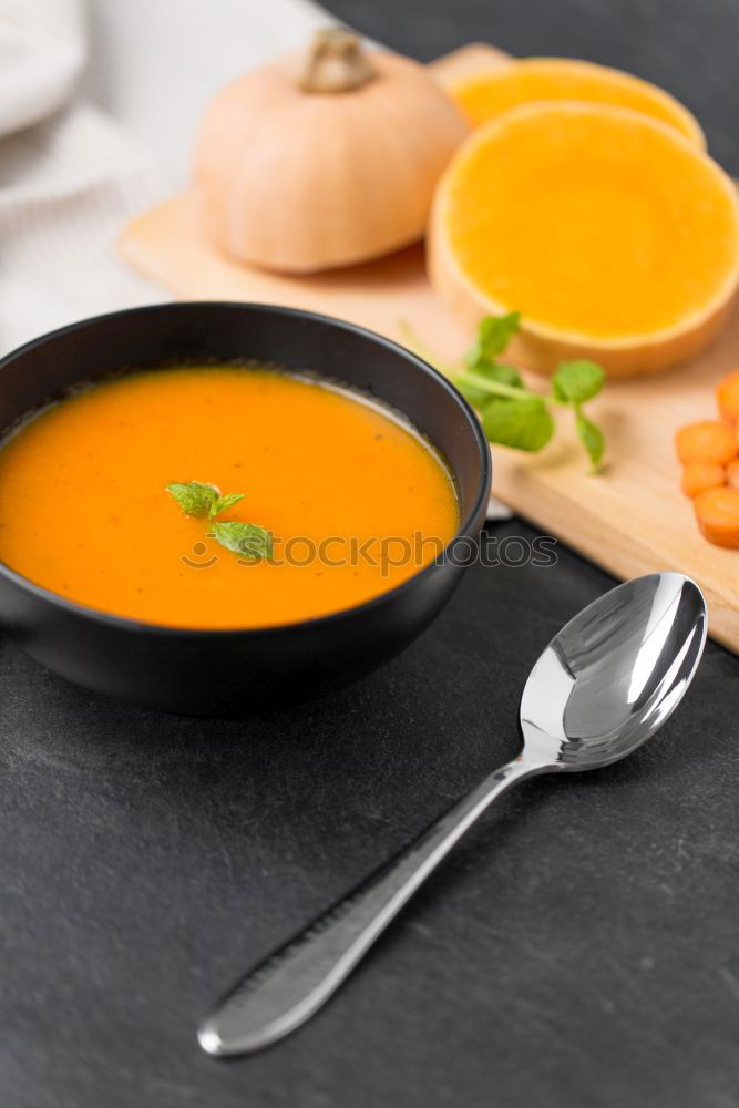 Similar – Image, Stock Photo Citrus juice in a glass on a dark table