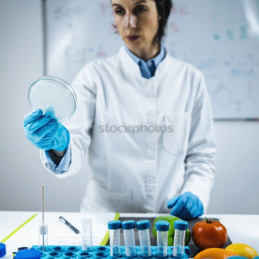 Similar – Image, Stock Photo Woman in whites standing in lab