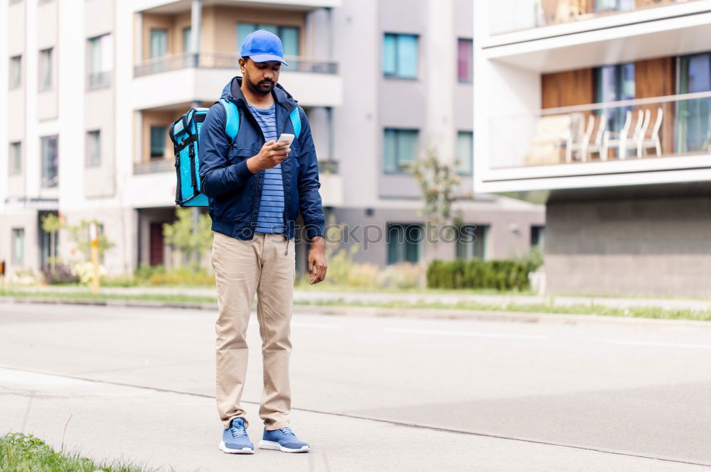 Similar – Image, Stock Photo Young man with mobile phone and fixed gear bicycle.