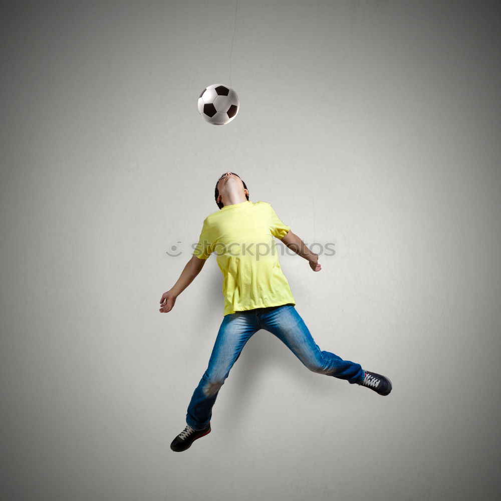 Similar – Young little boy playing in the field with soccer ball. Concept of sport.