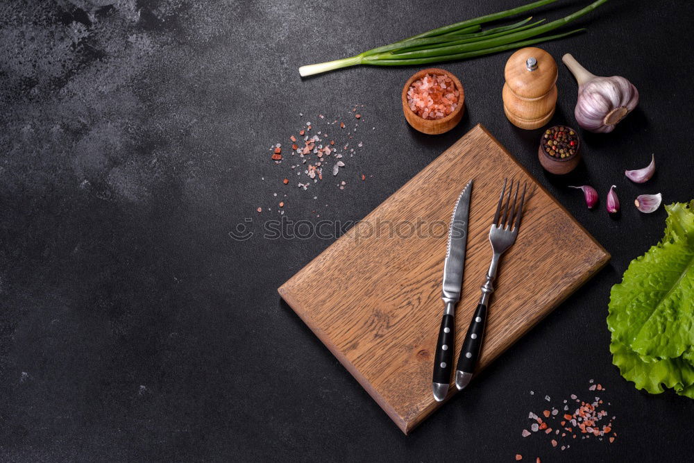 Similar – Image, Stock Photo Wild garlic pesto ingredients on dark rustic kitchen table