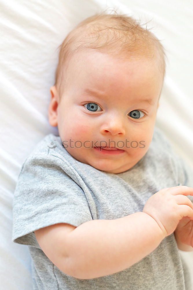 Similar – Cute Baby Girl Lying in the Crib.