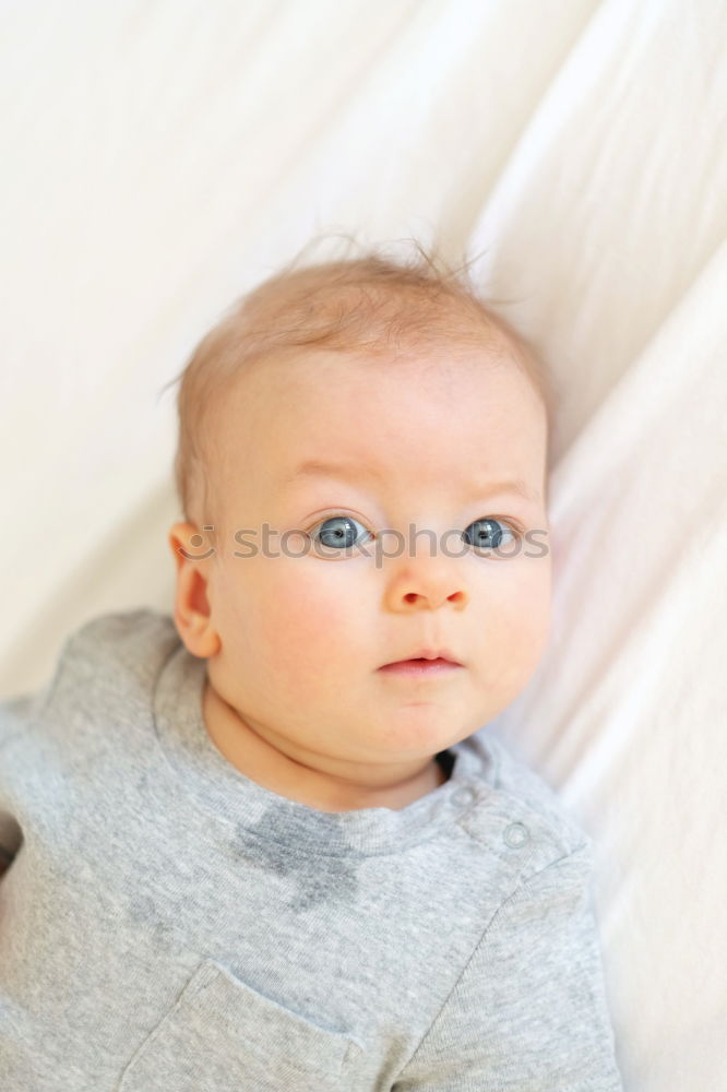 Similar – cute happy baby boy awake in his bed in the morning