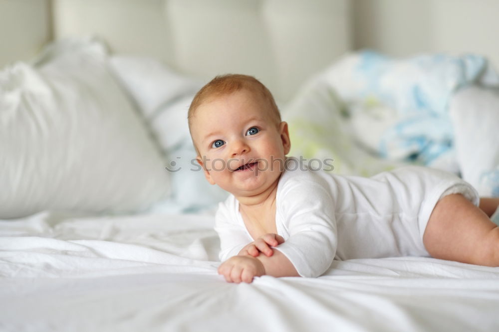 Similar – cute happy child girl relaxing at home on the bed