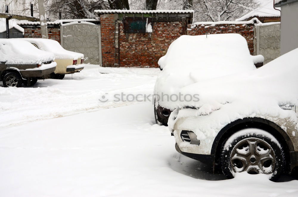 Similar – Image, Stock Photo 2 cut off windshield wipers sticking out of a car covered with snow