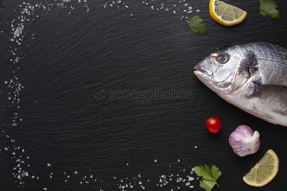 Similar – Image, Stock Photo Preparing whole salmon fish for cooking.