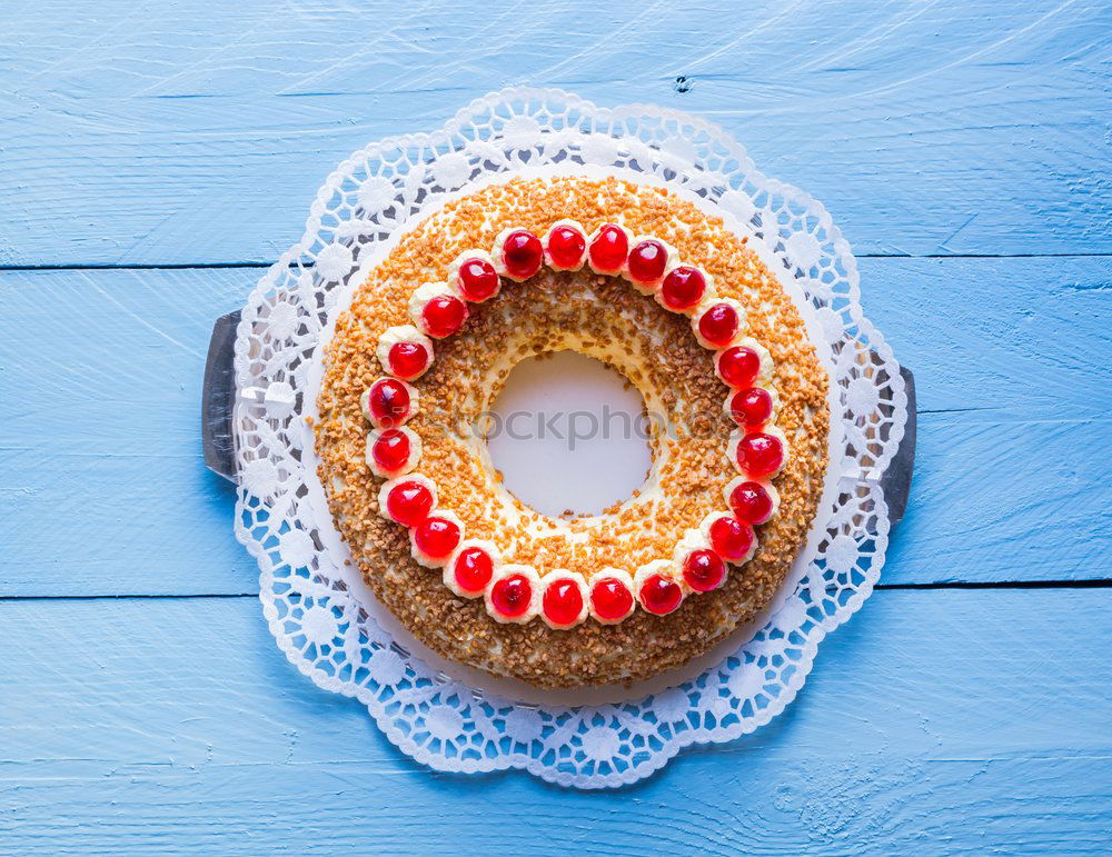 Similar – Image, Stock Photo Frankfurt wreath with cherries on turquoise wood