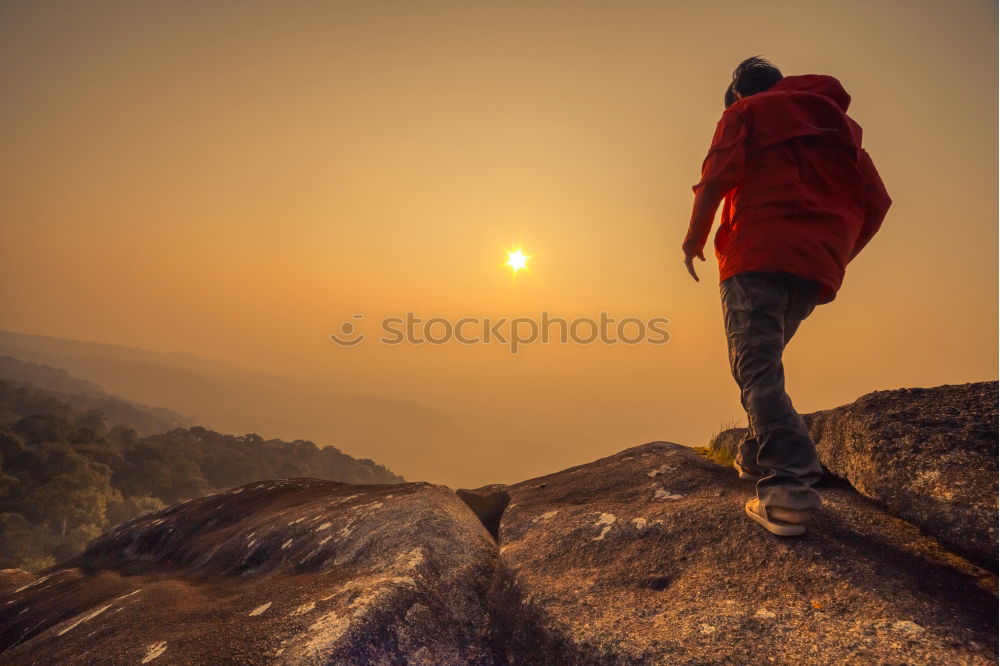 Similar – Mann auf Bergen im Schwarzwald zum Sonnenuntergang über dem Oberrheingraben