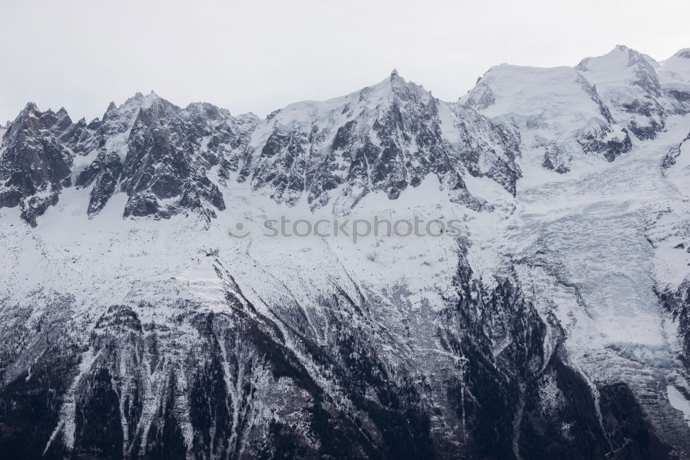 Similar – Beautiful snow covered mountain peak in the Cordillera Blanca range of Huascaran National Park, Peru