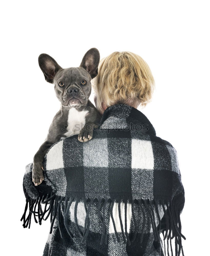 Young happy woman hugging her dog