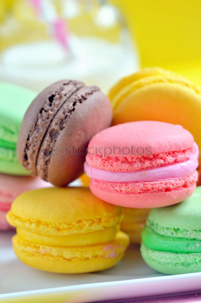 Three multi-colored almond macaroons