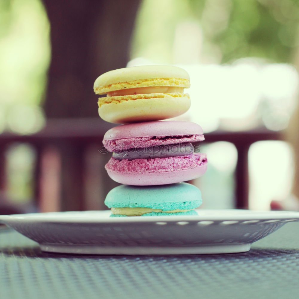 Similar – Image, Stock Photo Three colorful macarons stacked