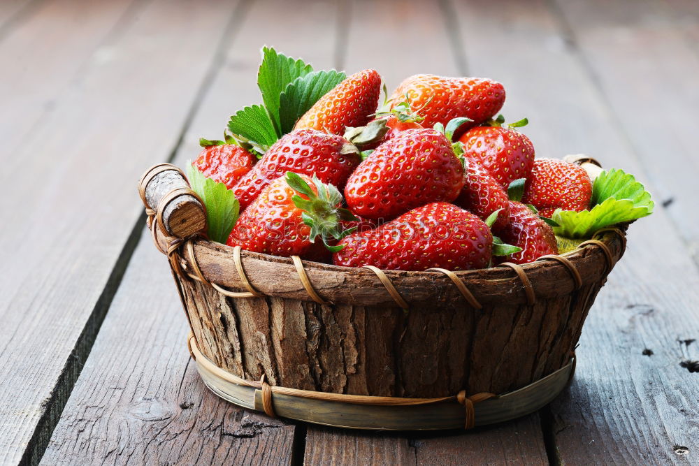 Similar – Image, Stock Photo Three small buckets of strawberry on old vintage wood